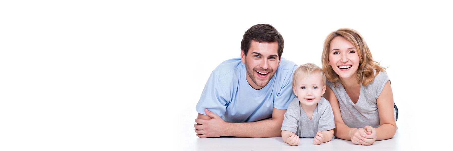 Two parents and their baby