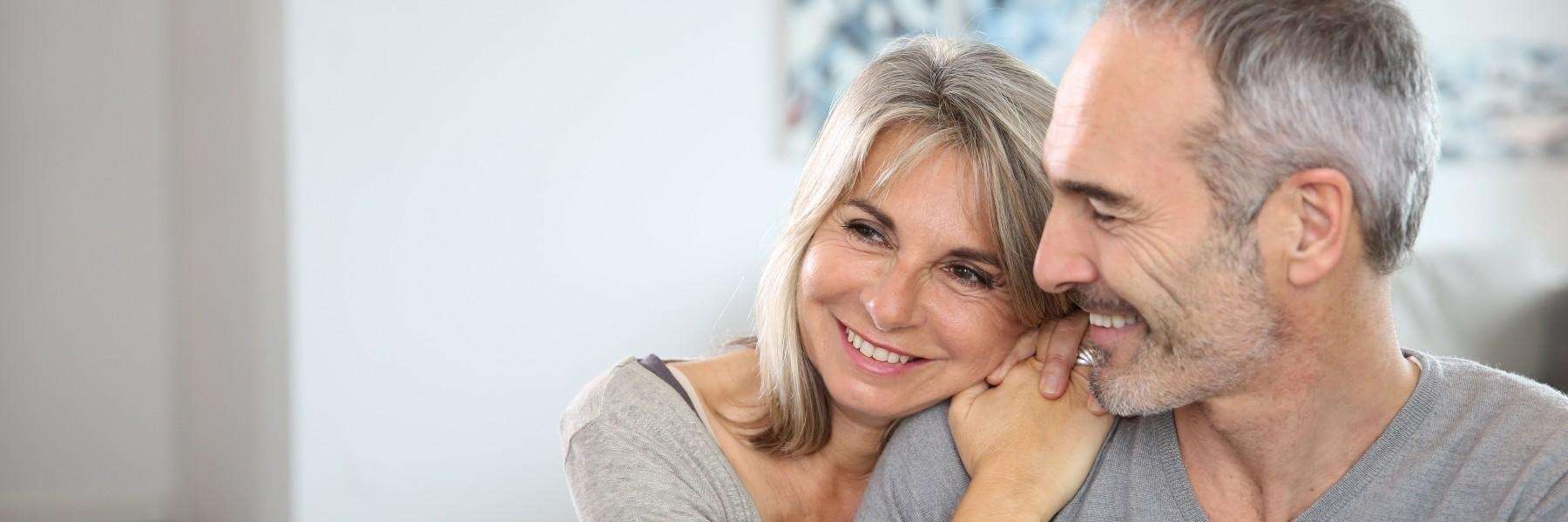 A smiling couple at home | cracked teeth armidale nsw