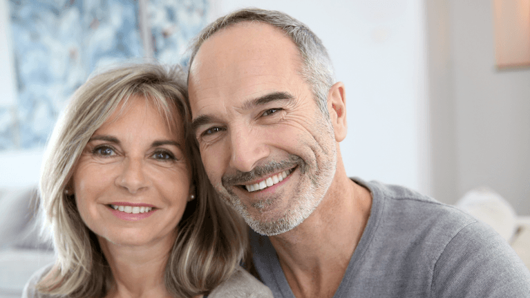 Couple smiling with their dental implant in Armidale NSW