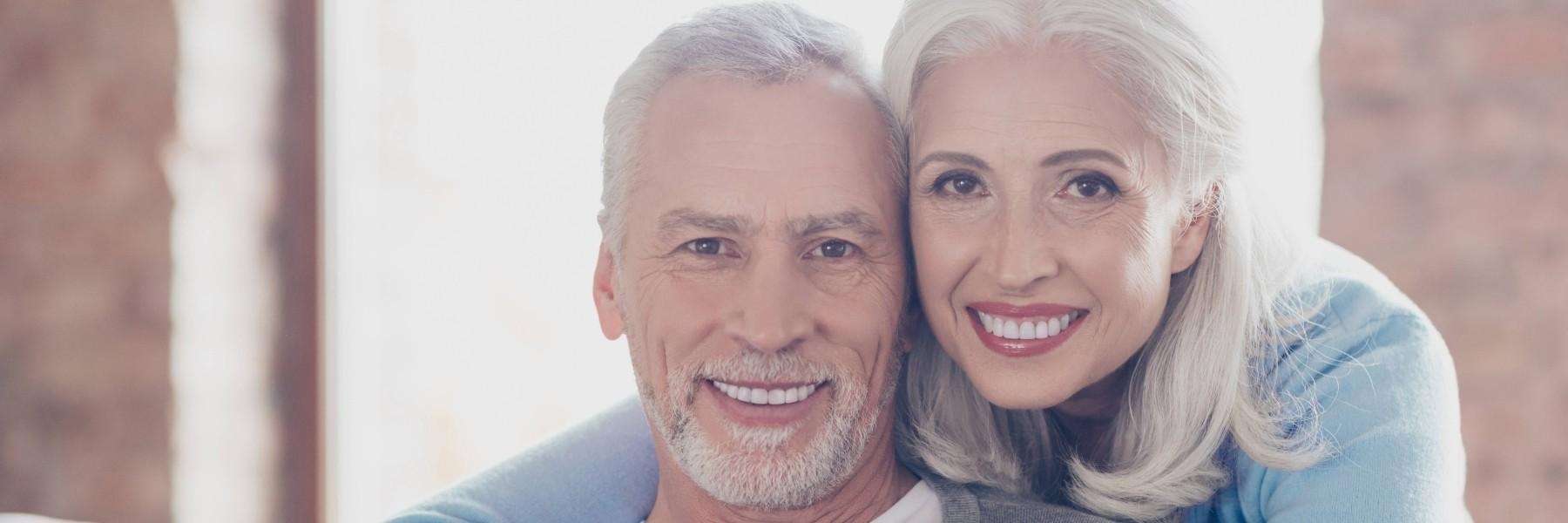 A couple smiling | dentures Armidale NSW